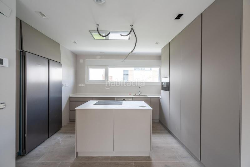 Foto d23f67b9-ee62-4c13-aca5-22faecb23cc3. Casa adossada amb calefacció aparcament piscina a Rozas de Madrid (Las)