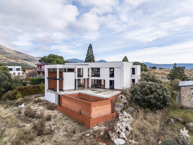 Foto cd8b04d8-ecd9-48da-a273-3d34059f23d5. Xalet amb calefacció aparcament piscina a Los Ángeles de San Rafael Espinar (El)