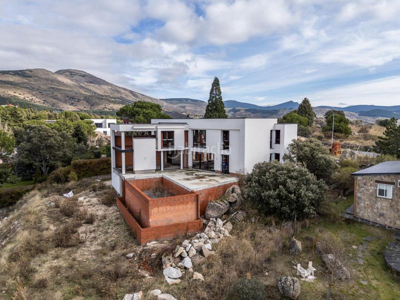 Foto f3424cbd-46da-4185-af2b-4ba17e291785. Xalet amb calefacció aparcament piscina a Los Ángeles de San Rafael Espinar (El)