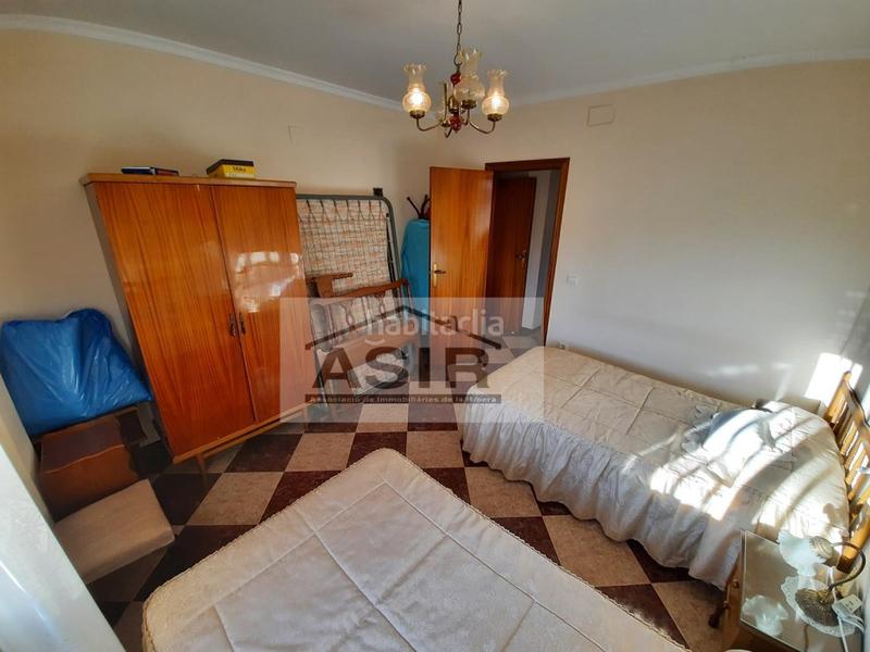 Foto 6c7f4e19-fb4a-4e62-a32e-3fc5bb217f28. Casa excelente casa chaflán muy amplia con garaje y terraza en Tous