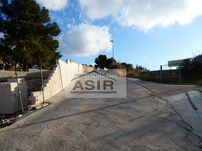 Foto d20f3651-16e3-4940-9313-877b59a3f08b. Terreno residencial sin ninguna comisión!! excelente parcela chaflán con proyecto para construir con luz y agua en la urbanización el respirall en Alzira