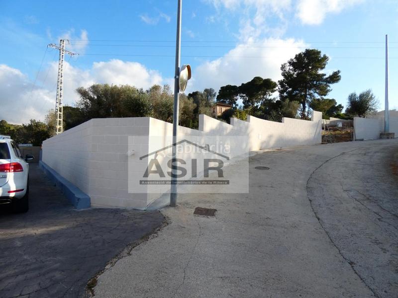 Foto d3a0fc67-fe17-4e1e-a94a-09f528da5565. Terreno residencial sin ninguna comisión!! excelente parcela chaflán con proyecto para construir con luz y agua en la urbanización el respirall en Alzira