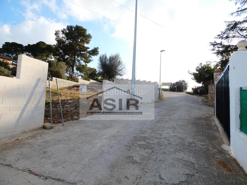 Foto de08f78c-c748-4c71-9bbc-7b93add1d0d3. Terreno residencial sin ninguna comisión!! excelente parcela chaflán con proyecto para construir con luz y agua en la urbanización el respirall en Alzira