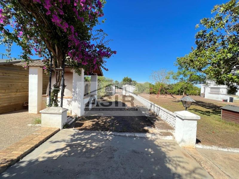 Foto 8a0aa59a-7f21-4d95-836b-4db6de6b021d. Chalet with parking pool in Urbanitzacions i Pedanies Nord Alzira