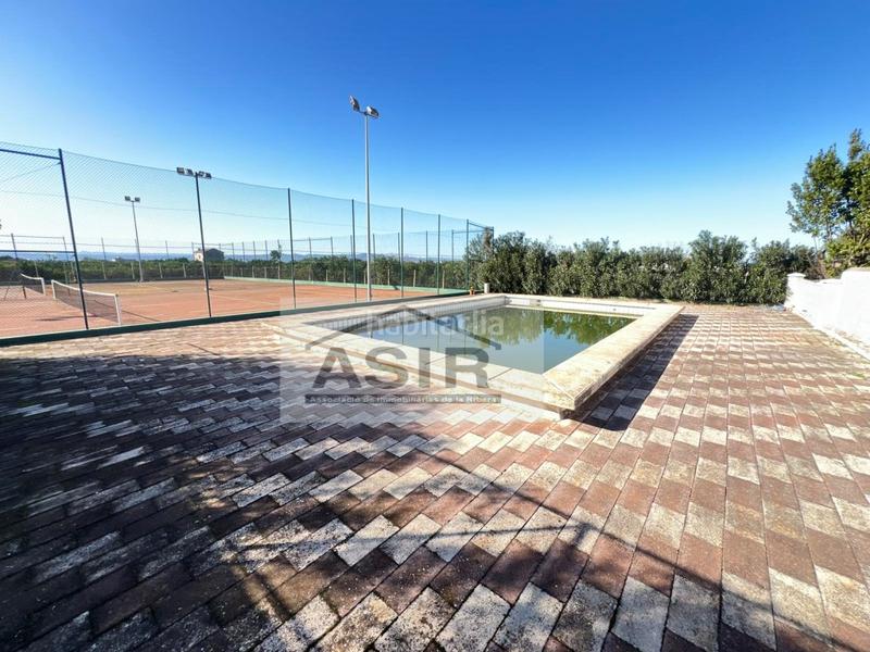 Foto 9b0b98e0-79ea-45ff-a0e4-3b0d84ced667. Chalet with parking pool in Urbanitzacions i Pedanies Nord Alzira