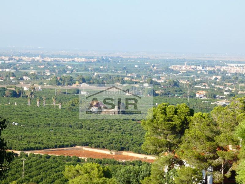 Foto 2b1a7489-782c-4486-b056-6ebdf190c1f4. Chalet bonito chalet en la urbanización el respirall en Alzira