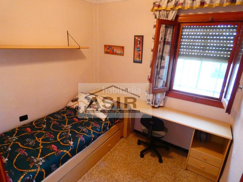 Foto 97f71894-c536-4e80-83c4-791438355a6b. Chalet bonito chalet en la urbanización el respirall en Alzira