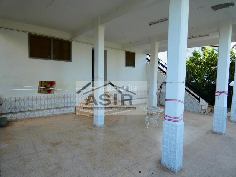 Foto dafb3b7d-ee26-4b27-bf52-8f43f2b7971c. Chalet bonito chalet en la urbanización el respirall en Alzira