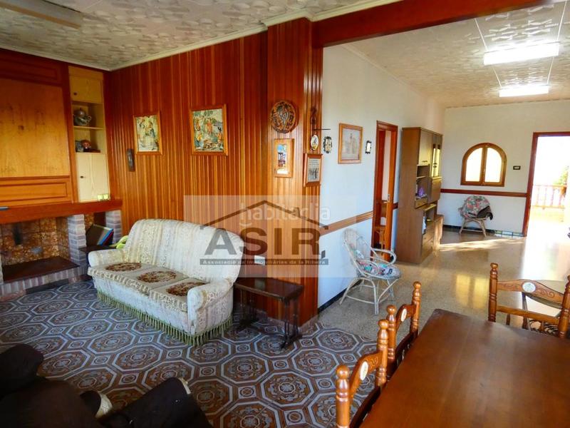 Foto ed59dd90-0344-4c27-ad1a-cb7caacb307f. Chalet bonito chalet en la urbanización el respirall en Alzira