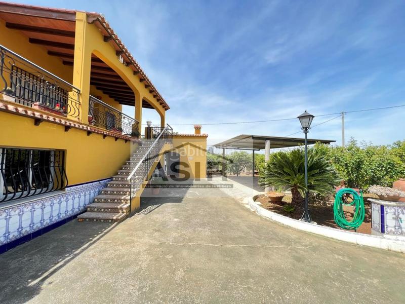 Foto 1030970e-fc81-48e5-ac9b-dc3e9938bc6d. Chalet mit parking pool in Urbanitzacions i Pedanies Nord Alzira