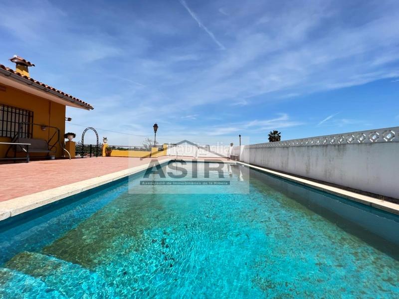 Foto 8c27c79e-7f72-488f-af70-ed7df9404a24. Chalet mit parking pool in Urbanitzacions i Pedanies Nord Alzira