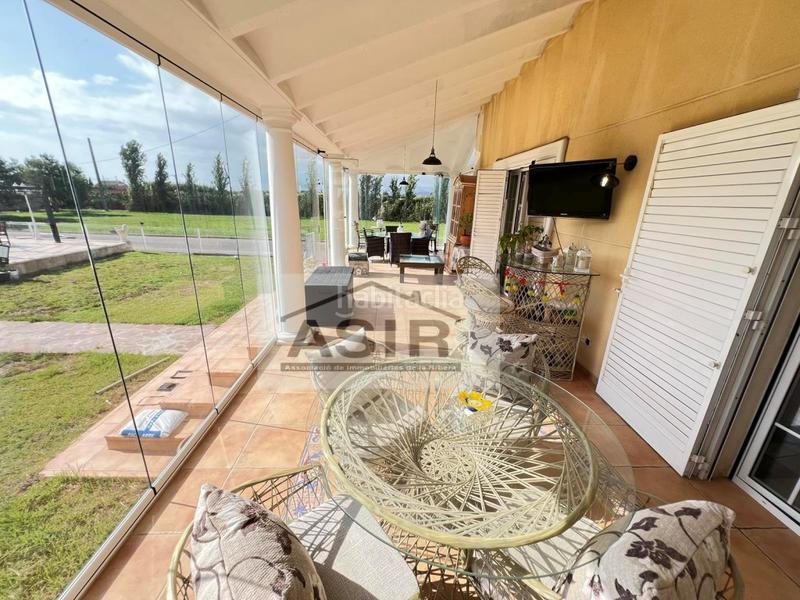 Foto 084eca79-2dbc-42d2-b05e-1c209fe50d88. Chalet avec parking piscine dans El Marenyet Cullera