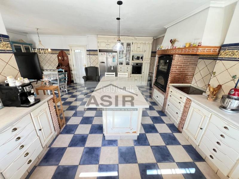 Foto 260131e6-7c6a-4b6a-8f20-6c88338a30e0. Chalet avec parking piscine dans El Marenyet Cullera