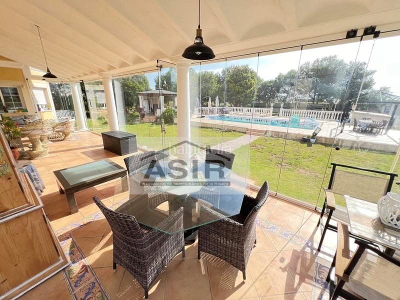 Foto 70c28de9-b1c3-44fa-bb25-24982b7d60b6. Chalet avec parking piscine dans El Marenyet Cullera