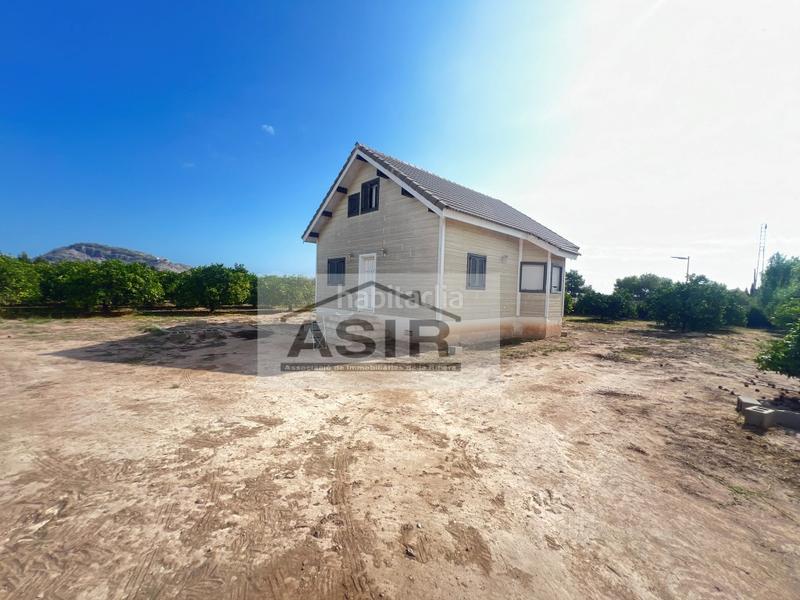 Foto 73e358ad-cbe1-4010-a543-3e314b580771. Chalet avec parking piscine dans El Marenyet Cullera