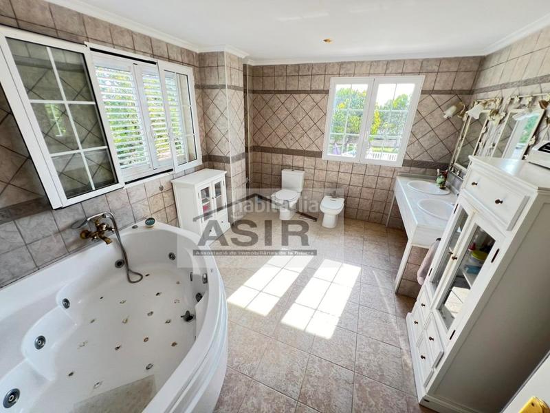 Foto 77bb8af1-453a-449d-b73b-1e305062b53a. Chalet avec parking piscine dans El Marenyet Cullera