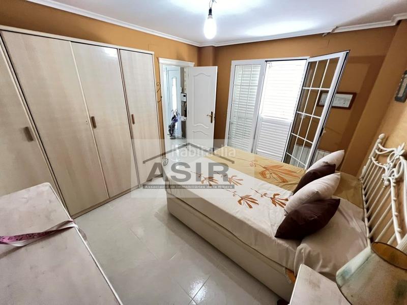 Foto a183a53e-1d24-4f88-870f-66574d48b732. Chalet avec parking piscine dans El Marenyet Cullera