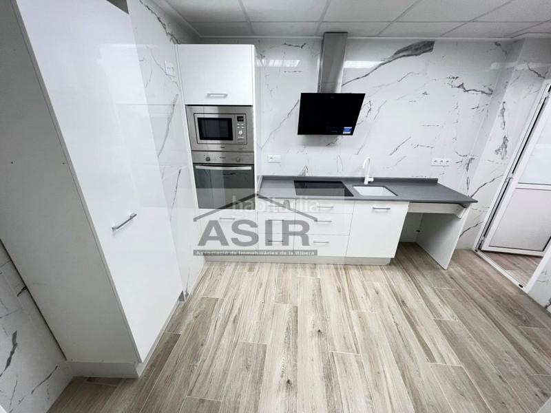 Foto a888e982-0f08-49a5-8cf2-a127c3733e08. Appartement avec parking dans Carcaixent