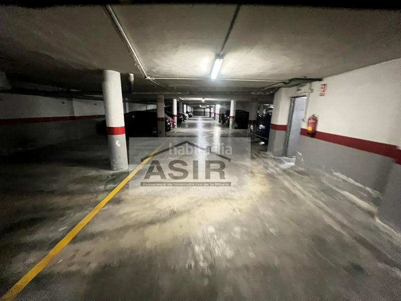 Foto c2df3dcd-9284-41dc-bc8f-570d4312da0c. Aparcament cotxe a Sants Patrons Alzira