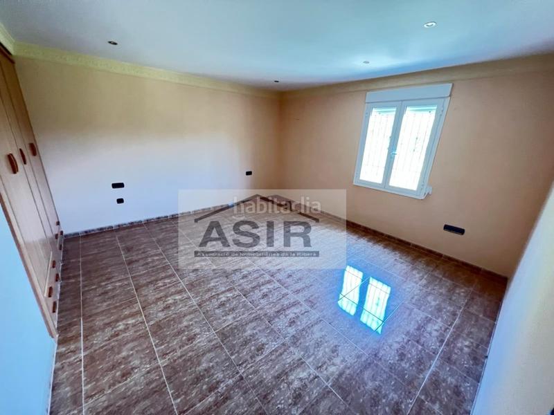 Foto 9d227917-a470-4d01-8d5d-0d8e38c84ec7. Chalet mit parking pool in Urbanitzacions i Pedanies Nord Alzira