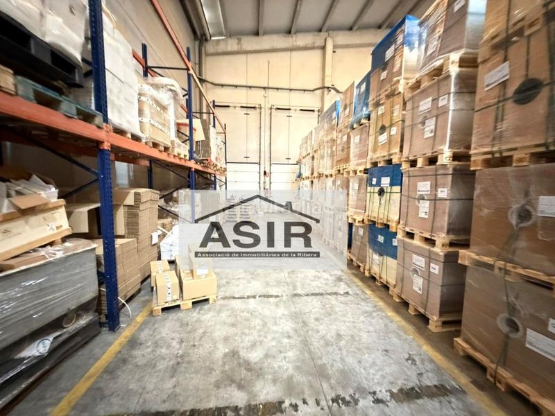 Foto 0244ac39-e5ad-4cbd-91d7-039bde2d02c8. Fabrikhalle in Pobla Llarga (la)