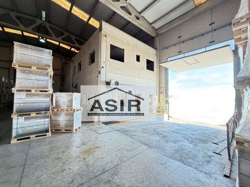 Foto 03bf856b-ff11-4eaa-855c-629f09deedce. Fabrikhalle in Pobla Llarga (la)