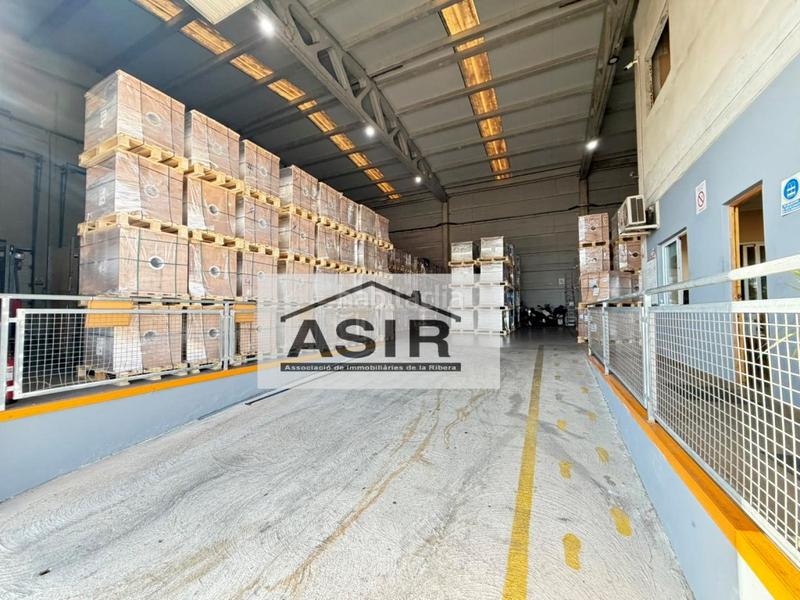 Foto 4b161786-f65a-420f-9bf7-759625e11e00. Fabrikhalle in Pobla Llarga (la)