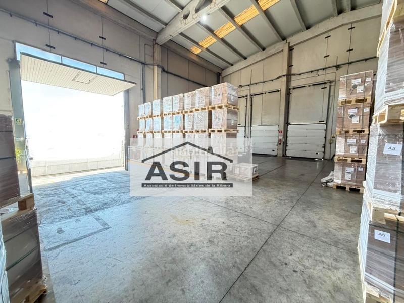 Foto 7ae486b6-f1d2-4849-8ed8-c128fcb656b3. Fabrikhalle in Pobla Llarga (la)
