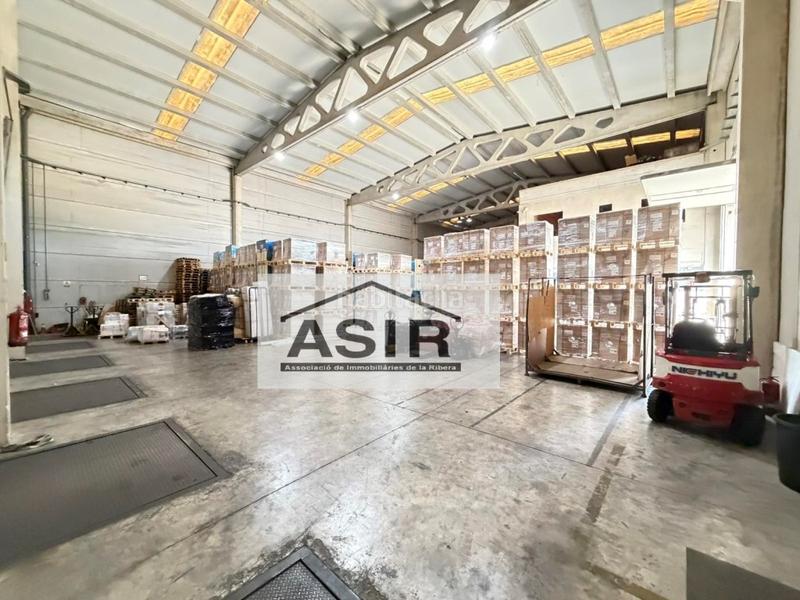 Foto 935a924a-633d-432a-aa40-f632c99aec06. Fabrikhalle in Pobla Llarga (la)