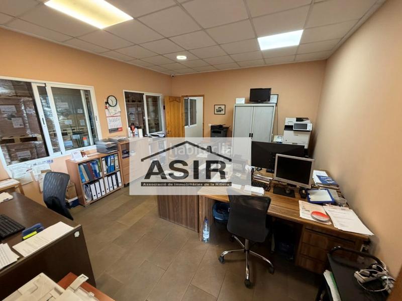 Foto b9616d23-0667-463f-94d8-de13c9664a44. Fabrikhalle in Pobla Llarga (la)