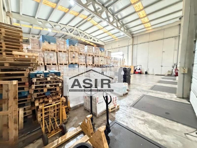 Foto c2416d5b-b4e8-455c-aed0-13c990b6249f. Fabrikhalle in Pobla Llarga (la)