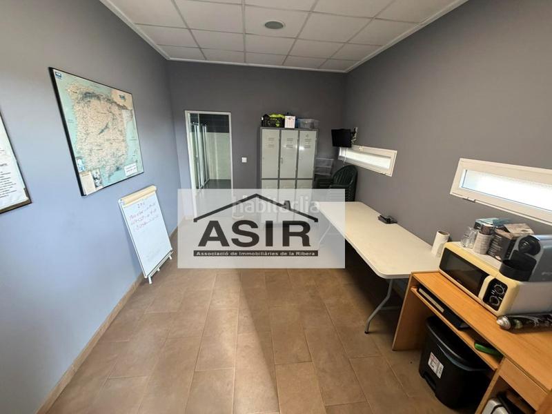 Foto d6a1f5e0-b1d6-4fbb-9286-aae46f5b43c7. Fabrikhalle in Pobla Llarga (la)