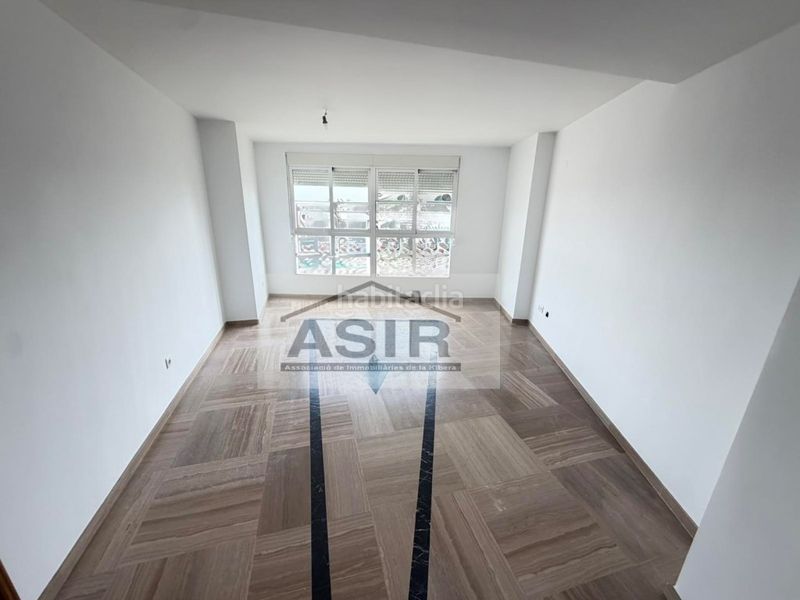 Foto 71a94e5a-ff90-43b9-a9f3-04f71cd94259. Pis amb aparcament a Algemesí