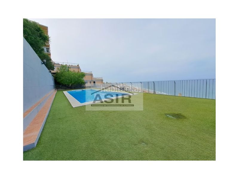 Foto bf4ebb0b-0af4-4b02-a6b3-3673f75220c6. Casa amb aparcament piscina a El Faro Cullera