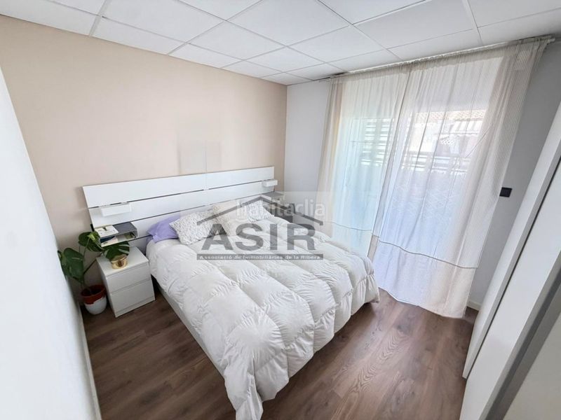 Foto f10b5f0a-14e0-4ef5-8792-b808851cd1ee. Casa a Polinyà de Xúquer