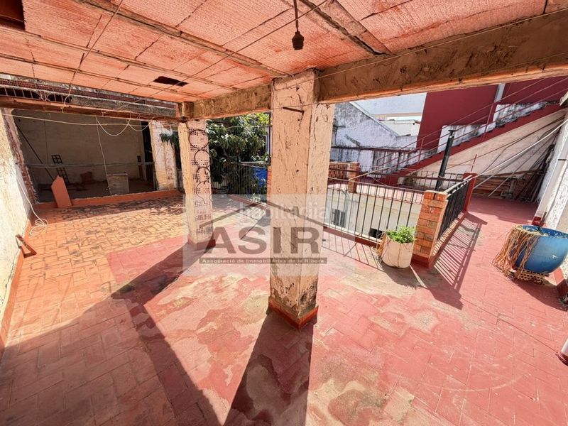 Foto 22579af2-d5b4-4d67-8731-8ca5269f08ae. Casa amb aparcament a Alquerieta Alzira