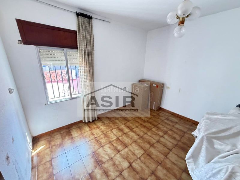 Foto a81a28a7-c9f0-412b-97f3-0d9ac41e6965. Casa amb aparcament a Alquerieta Alzira
