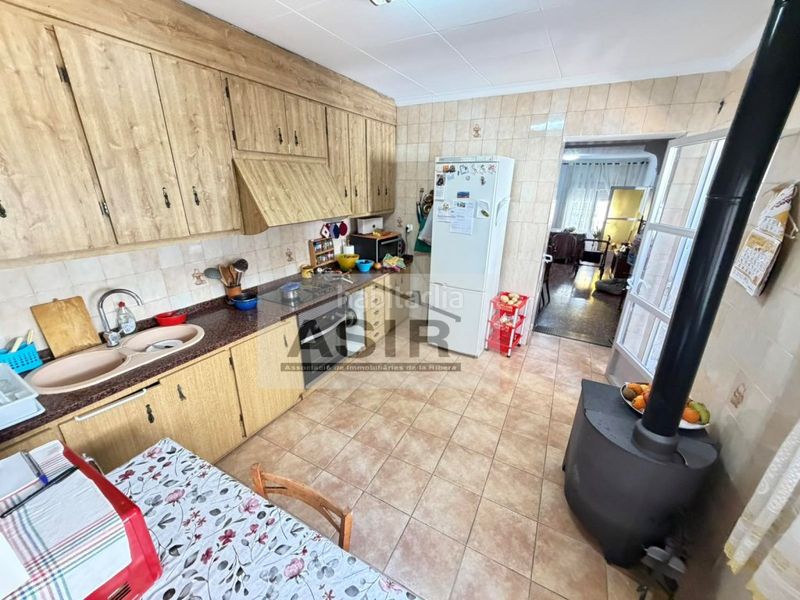 Foto ed38bd8d-ae96-402e-bead-af2b69b920bd. Casa amb aparcament a Alquerieta Alzira