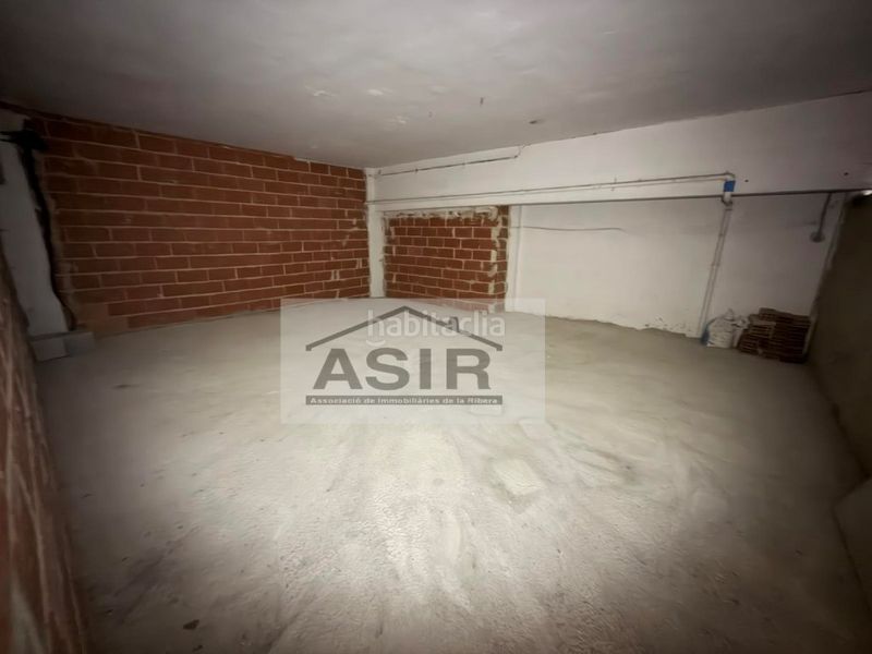 Foto 628a4880-e327-4ddc-a864-0a4d2fdbea86. Local comercial a Carcaixent