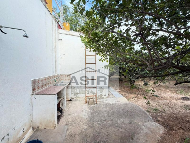 Foto 3a7a6432-9591-4502-a112-72667cb1c243. Xalet amb aparcament a Benicull De Xúquer