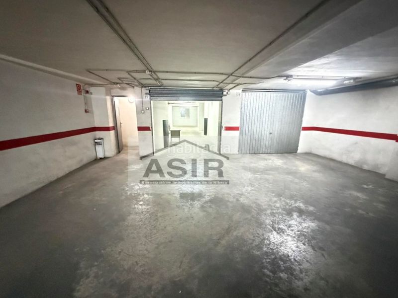 Foto 7f21c197-51b7-4eee-ac68-a7f2a3cf790a. Aparcament cotxe a Centre Alzira