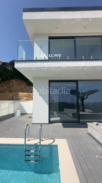 Foto 194ea6dd-aa80-441d-b0ce-cb6b039a838a. Casa amb calefacció aparcament piscina a Serra Brava Lloret de Mar