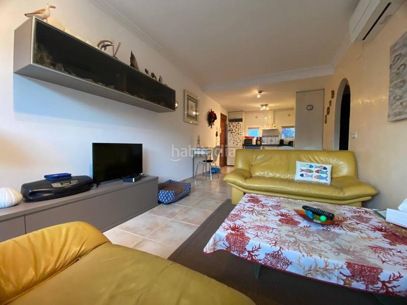 Foto d346f086-8d9b-4931-a8b7-bee80b6d7881. Piso apartamento con vistas al canal, garaje , amarre 8x4 y barco incluido!! en Empuriabrava