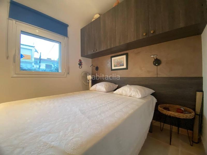 Foto dfcd4e94-8da3-4a61-b1f3-ee9c9dba097b. Piso apartamento con vistas al canal, garaje , amarre 8x4 y barco incluido!! en Empuriabrava