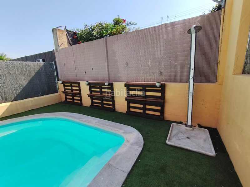 Foto 0c3d5c9f-eb32-4660-886b-4248a4ccc3d3. Casa adossada amb calefacció aparcament piscina a Navalcarnero