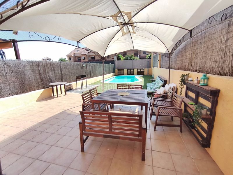 Foto 72995a8c-7428-4c5d-a110-8f6684abfc09. Casa adossada amb calefacció aparcament piscina a Navalcarnero