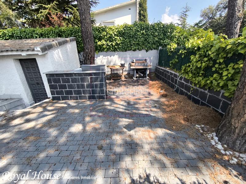 Foto 77e99da1-29e7-4b02-b4d9-eb4ddbcdb7d8. Casa aparellada amb calefacció aparcament piscina a Collado Villalba