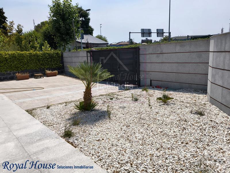 Foto 8880e809-1542-4006-8e9d-3f03fcc5bac2. Casa aparellada amb calefacció aparcament piscina a Collado Villalba