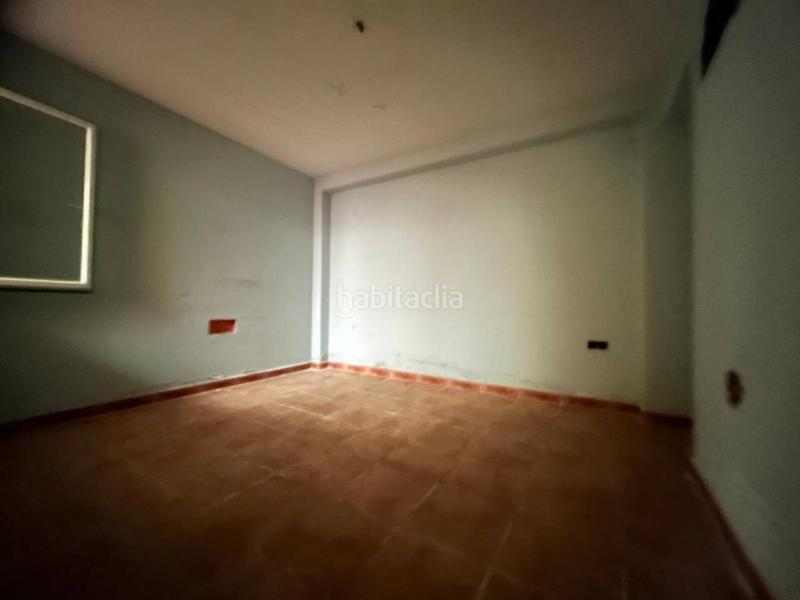 Foto 523b60f1-4feb-47e3-a855-424059faca9c. Reihenhaus mit parking in Consuegra