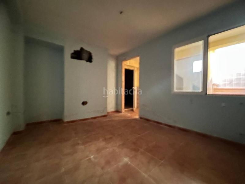 Foto b054ca9f-3d1e-4b21-a146-369dfaefe361. Reihenhaus mit parking in Consuegra